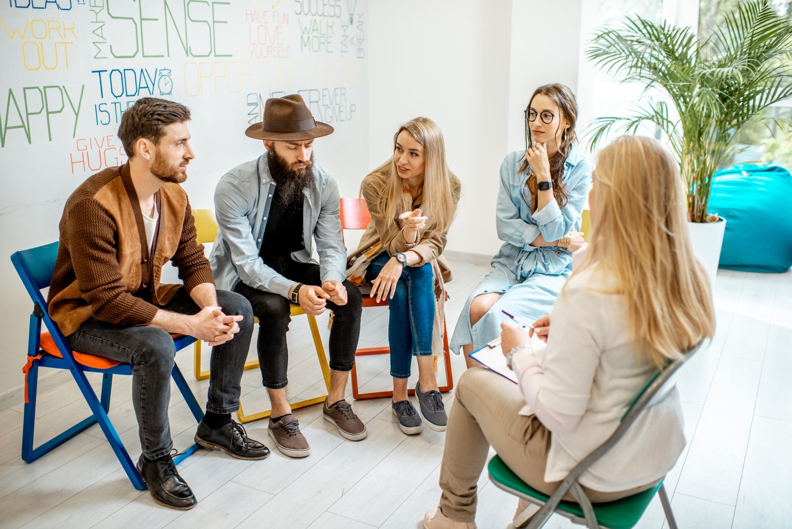 Group of people during the psychological therapy indoors